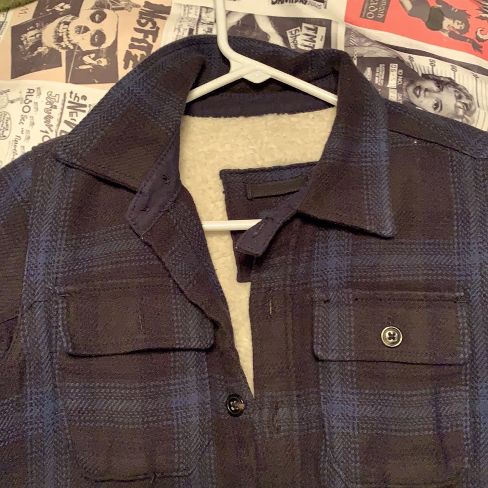 Blue plaid faux Sherpa coat.